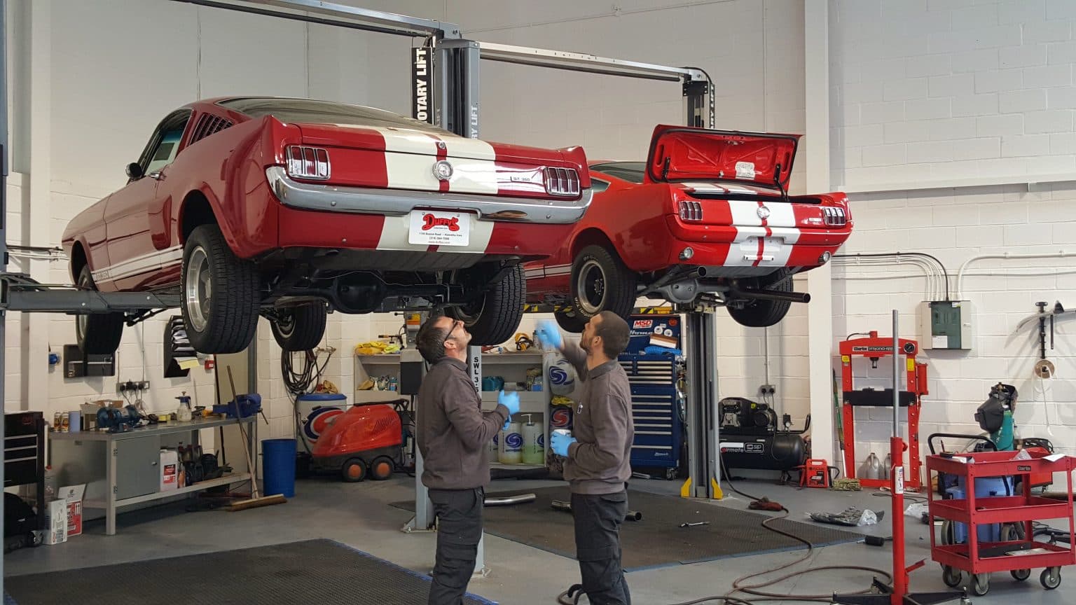 New car ramps being installed in the ShipMyCar workshop
